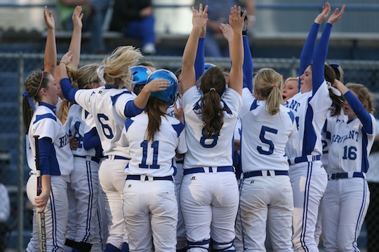 The Bryant Lady Hornets celebrate at home plate after Shanika Johnson's solo homer in the fourth. (photo by Rick Nation)