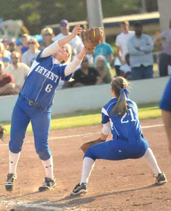 Peyton Jenkins grabs an infield pop in front of teammate Kayla Sory. (Photo by Kevin Nagle)