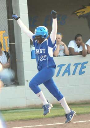 Shanika Johnson celebrates her two-run homer. (Photo by Kevin Nagle)
