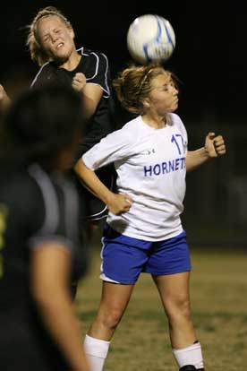 Tarra Hendricks gets her head on a pass. (Photo by Rick Nation)