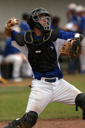 Bryant catcher B.J. Ellis fires a throw to second. (Photo by Rick Nation)