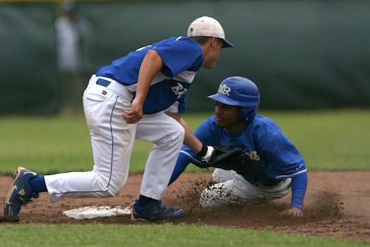 Bryant second baseman Chris Joiner tags out North Little Rock's Shaquille Hayes as he tries to steal during the fifth inning of Saturday's game. (Photo by Rick Nation)