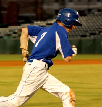 Jordan Taylor rounds third and heads home with one of Bryant's 12 runs Friday night. (Photo courtesy of Phil Pickett)