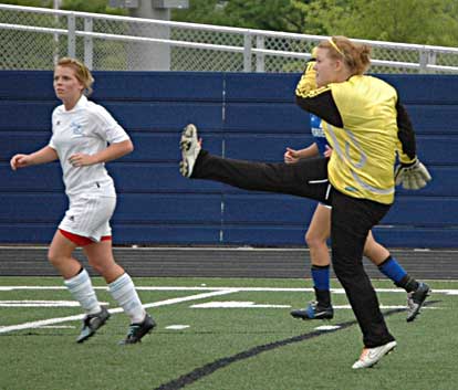 Bryant goalkeeper Kaitlin Miller, right. (Photo by Mark Hart)