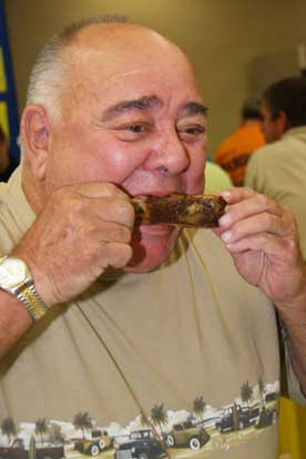 Jimmy Morgan digs into a rib from Colton's.