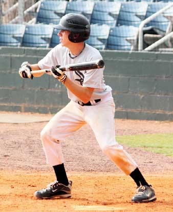 Bryant's Caleb Garrett tries to get a bunt down batting left-handed during Saturday's game. (Photo by Phil Pickett)