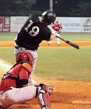 Ben Wells singles up the middle. (Photo by Phil Pickett)