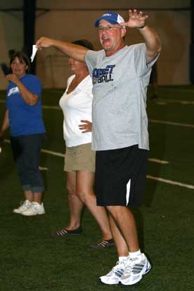 Defensive coach Steve Griffith demonstrates the aggressive look. (Photo by Rick Nation)