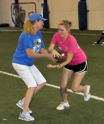 Practicing the handoff (Photo by Kevin Nagle)