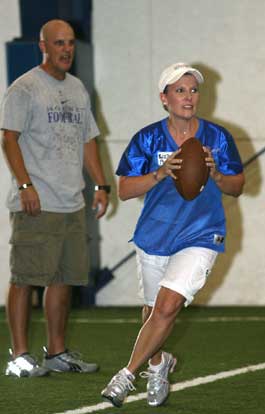 Lisa Price rolls right as coach Dale Jones shouts encouragement. (Photo by Rick Nation)