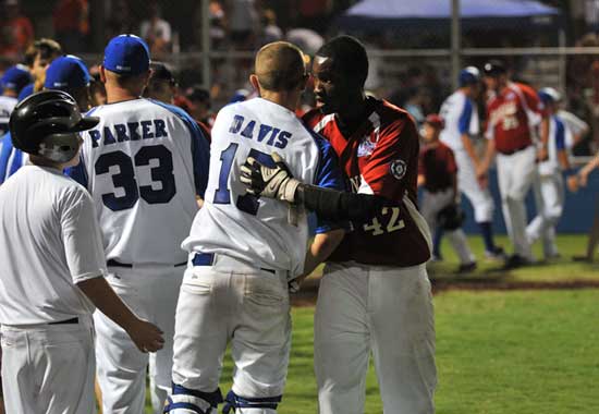 Bryant's Josh Davis and White Hall's Percy Arnold shake hands after Saturday's game. (PHoto courtesy of Ron Boyd)