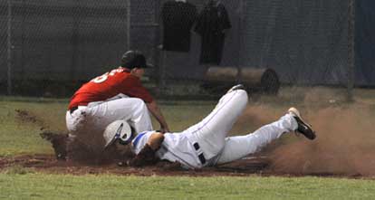 Bryant's Tryce Schalchlin gets a face full of dirt as he slides safely into third ahead of a throw from the outfield. (Photo courtesy of Ron Boyd)