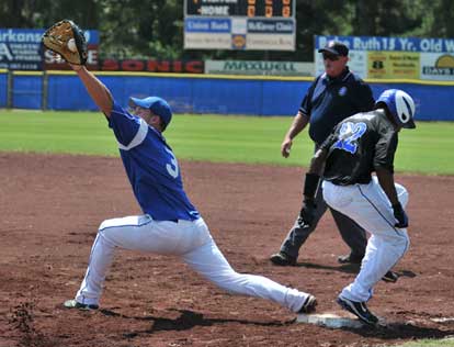 Bryant's Marcus Wilson beats a throw to first on his first-inning bunt single. (Photo courtesy of Ron Boyd)