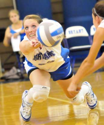 Brittan Hays dives to dig up a volley. (Photo by Kevin Nagle)