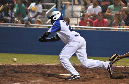 Marcus Wilson gets a bunt down. (Photo by Ron Boyd)