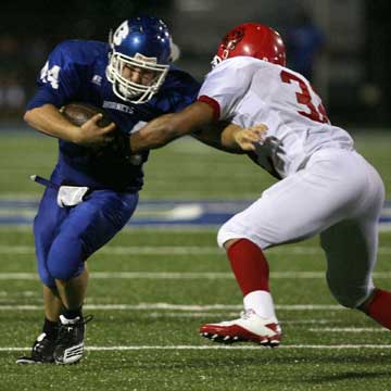 Bryant's Dylan Pritchett tries to work past Northside linebacker Chevez Clements. (Photo by Rick Nation)