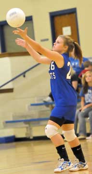 Ashlee Caton prepares to serve. (Photo by Kevin Nagle)