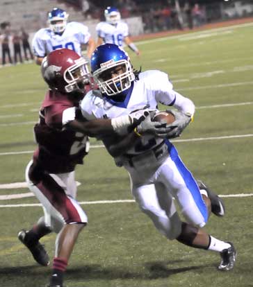 Bryant's Dillon Winfrey breaks a tackle on the way into the end zone. (Photo by Kevin Nagle)