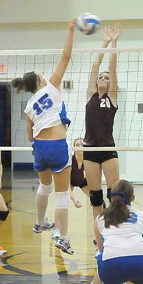 Bryant's Brooke Howell goes up for a spike. (Photo by Kevin Nagle)