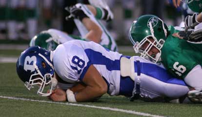 Hunter Mayall led the team in fumble recoveries in 2009 with four including this one at Van Buren. (Photo by Rick Nation)