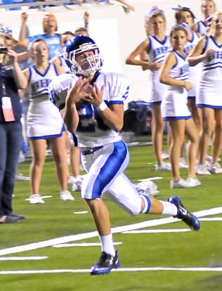 Tanner Tolbert catches a touchdown pass. (Photo by Kevin Nagle)