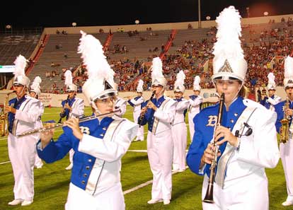 Two of the soloists for the Legacy of Bryant's marching show are Callie Smith, left, and Reagan Higgins. 