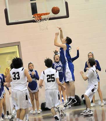 Bryant's Mitch Scoggins scores inside late in Thursday's game. (Photo by Kevin Nagle)