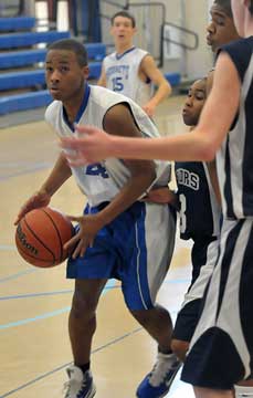 Brushawn Hunter, left, looks to drive around a double-team. (Photo by Kevin Nagle)