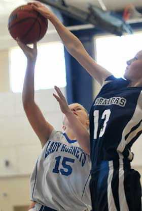 Sadie Powers' shot is blocked. (Photo by Kevin Nagle)