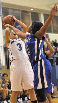 Bryant's McKenzie Adams (3) is fouled by Conway's Quay Allen-Smith. (Photo by Kevin Nagle)