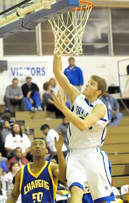 Quinton Motto goes up for a lay-up. (Photo by Kevin Nagle)