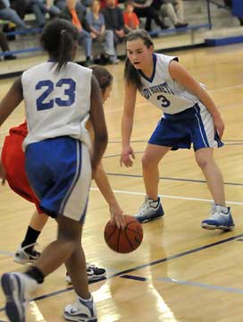 Abby Staton (3) and Jayla Anderson apply defensive pressure. (Photo by Kevin Nagle)