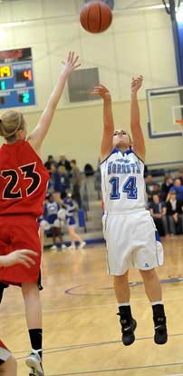 Caylin Choate (14) shoots over Cabot South's Lakyn Crumbley. (Photo by Kevin Nagle)