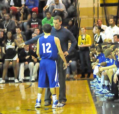 Bryant head coach Mike Abrahamson makes a point with junior Brantley Cozart. (Photo by Kevin Nagle)