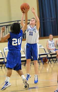 Isabella Bluemmel (11) led Bryant Blue with 12 points Monday night. (Photo by Kevin Nagle)