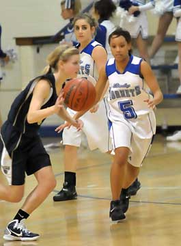 Melinda Murdock (5) tries to get back to cut off Pulaski Academy's Blake Bartlett. (Photo by Kevin Nagle)