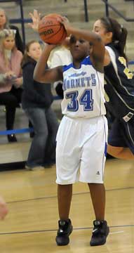 Destin Nichols launches a shot. (Photo by Kevin Nagle)