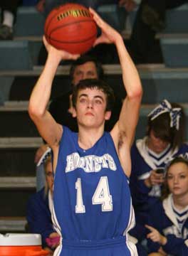 Logan Trudell launches a 3-point try. (Photo by Rick Nation)