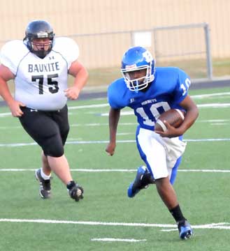 Bryant's Davonte Howard keeps around the end. (Photo by Kevin Nagle)