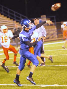 Bryant quarterback Ty Harris launches a pass. (Photo by Kevin Nagle)