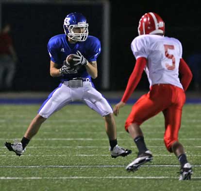 Sawyer Nichols (1) makes a move to get past Cabot's Jordan Burke. (Photo by Rick Nation)