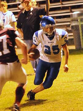 Houston Chavis makes a move past a Benton defender. (Photo by Kevin Nagle)