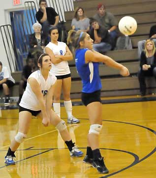 Bekka Shaddon (26) backs up Caylin Choate. (Photo by Kevin Nagle)