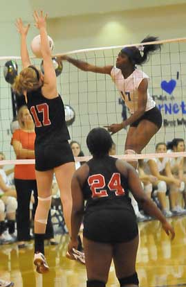 Brianna White skies on an attack. (Photo by Kevin Nagle)