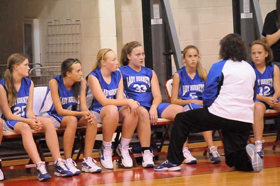 Bryant Blue coach Rhonda Hall instructs her team during a break in Thursday's action. (Photo by Kevin Nagle)
