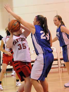 Peyton Ramsey (24) applies some defensive pressure. (Photo by Kevin Nagle)