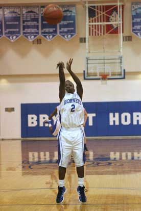 Kemith Buffington adds a final free throw. (photo by Rick Nation)