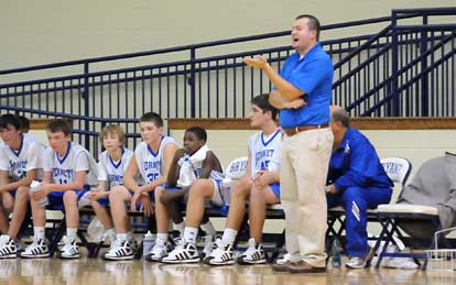 Bryant White coach Heath Long exhorts his team. (Photo by Kevin Nagle)