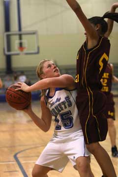 Bryant's Sadie Powers (15) tries to find room for a shot. (Photo by Rick Nation)