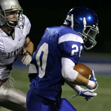 Drew Tipton  (20) heads upfield after picking up a fumble. (Photo by Rick Nation)